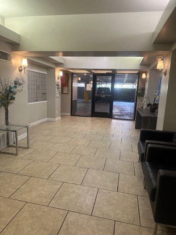 Modern apartment lobby with seating area
